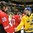 GRAND FORKS, NORTH DAKOTA - APRIL 18: Switzerland's Oskar Steen #20 and Sweden's Lias Andersson #26 shake hands after Sweden's 8-1 preliminary round win at the 2016 IIHF Ice Hockey U18 World Championship. (Photo by Minas Panagiotakis/HHOF-IIHF Images)

